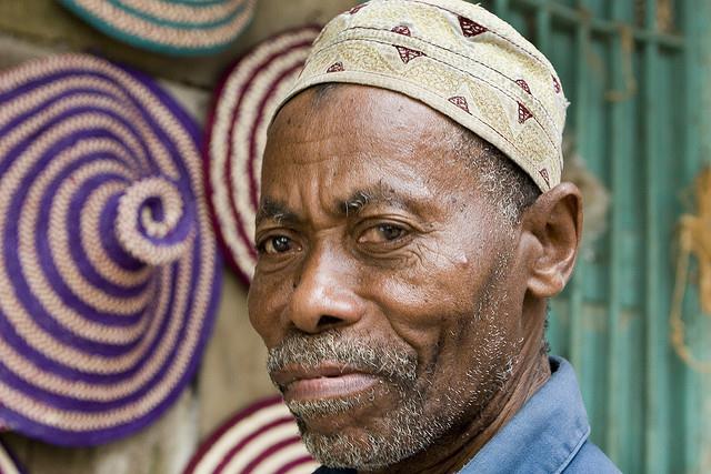 Man with Baskets in Zanzibar